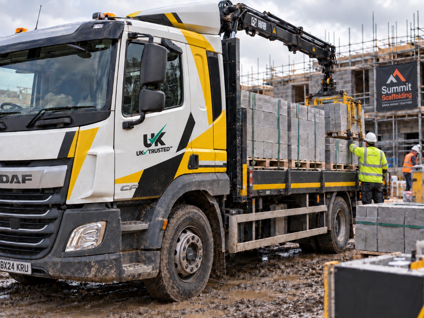 UK Trusted™ logo on a delivery lorry at a construction site